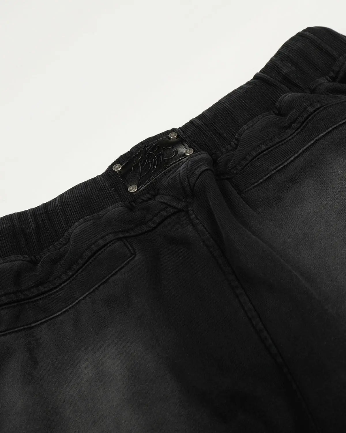 Distressed washed baggy sweatpants from INFLATION streetwear collection, casual fit with a worn, vintage look.