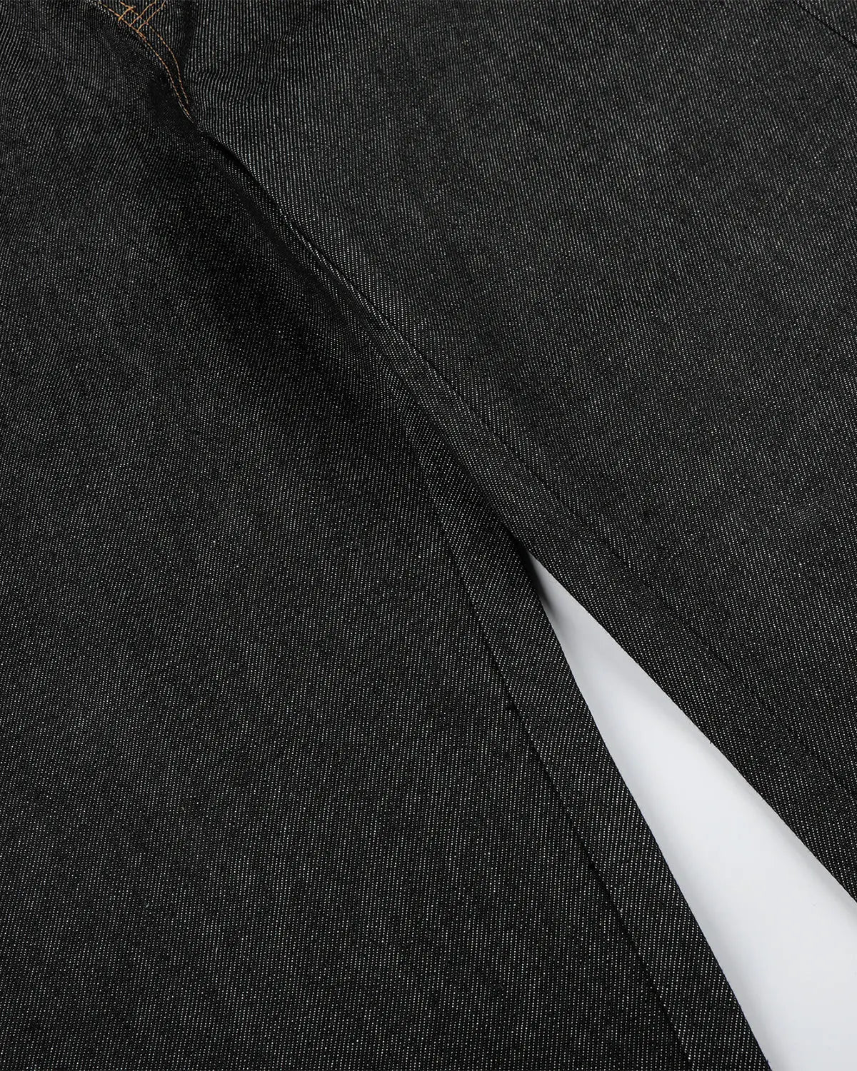 Inflation streetwear raw baggy jeans with button fly, relaxed fit, denim fabric, featuring visible stitching and casual style.