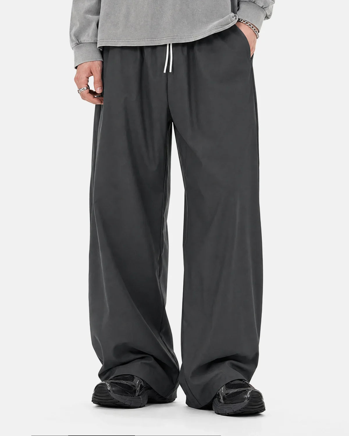 Wide-leg AirFlow Cooling Pants by INFLATION featuring lightweight fabric and relaxed fit for comfortable wear.