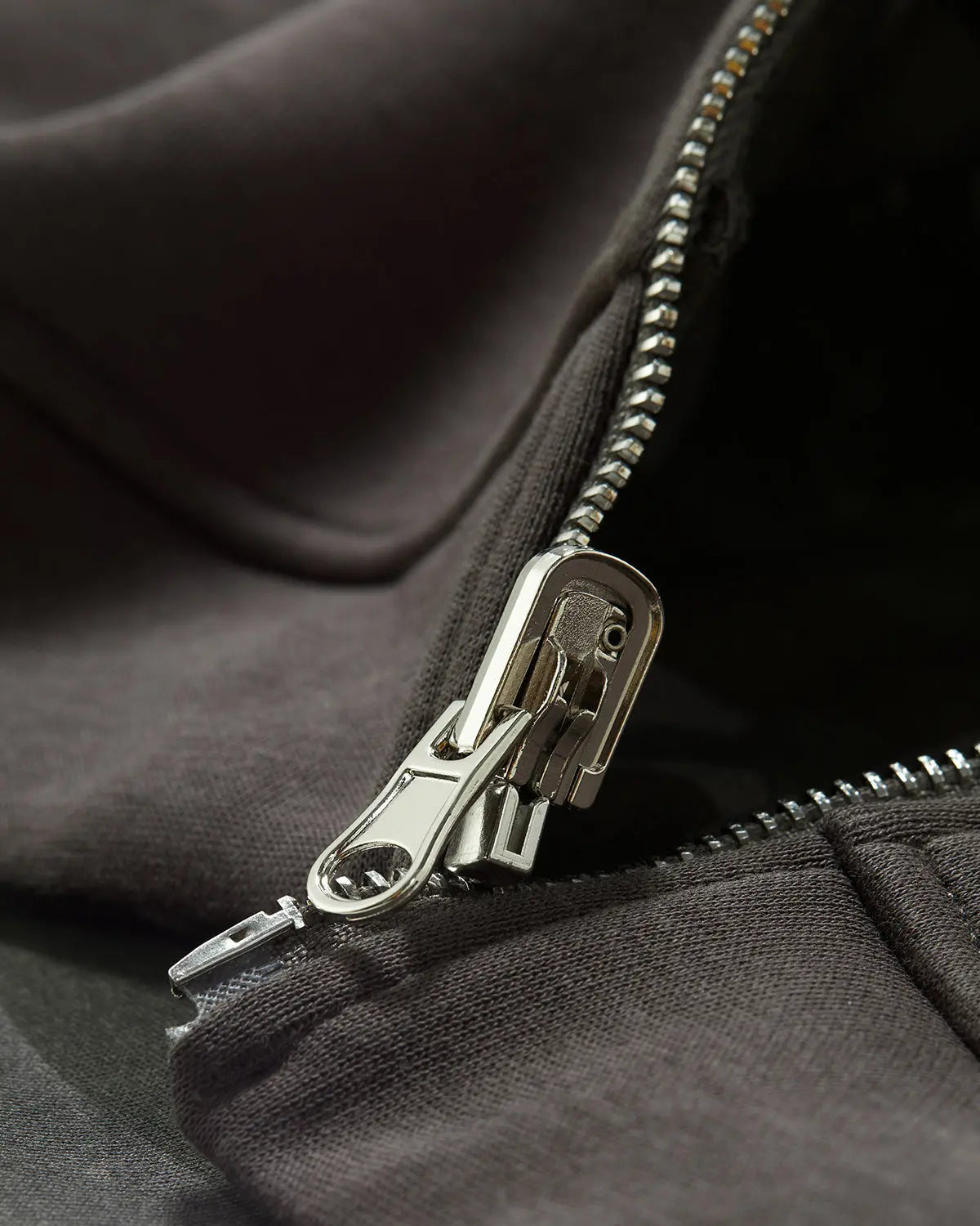 Reversible camo zip-up jacket by INFLATION, featuring camouflage pattern and casual streetwear style.