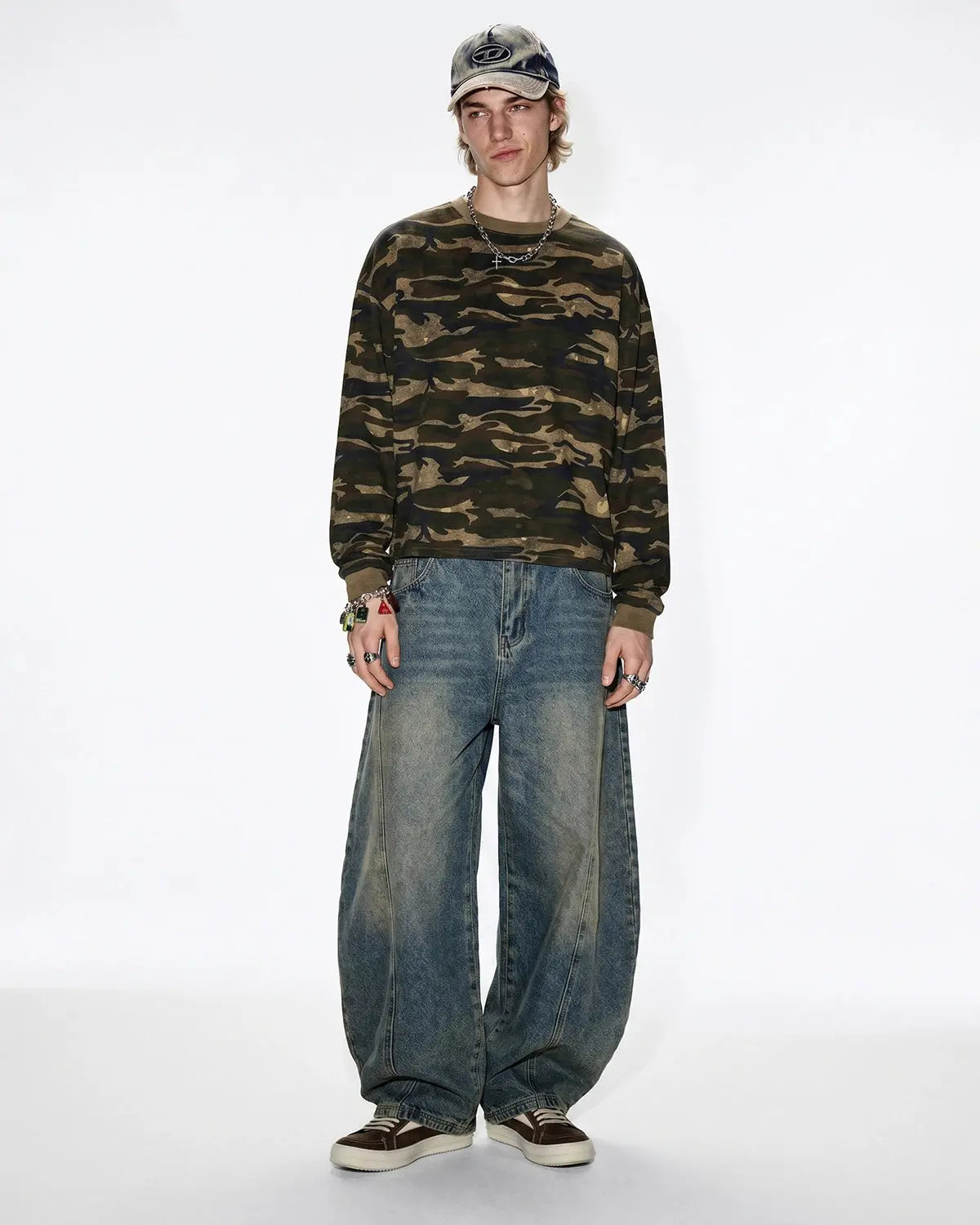 Boxy camo T-shirt in khaki from INFLATION's streetwear collection, featuring a relaxed fit and camouflage pattern.