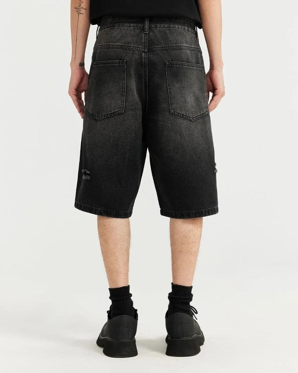 Vintage ripped washed jorts by INFLATION, denim shorts with distressed details and frayed hems, styled for casual streetwear.