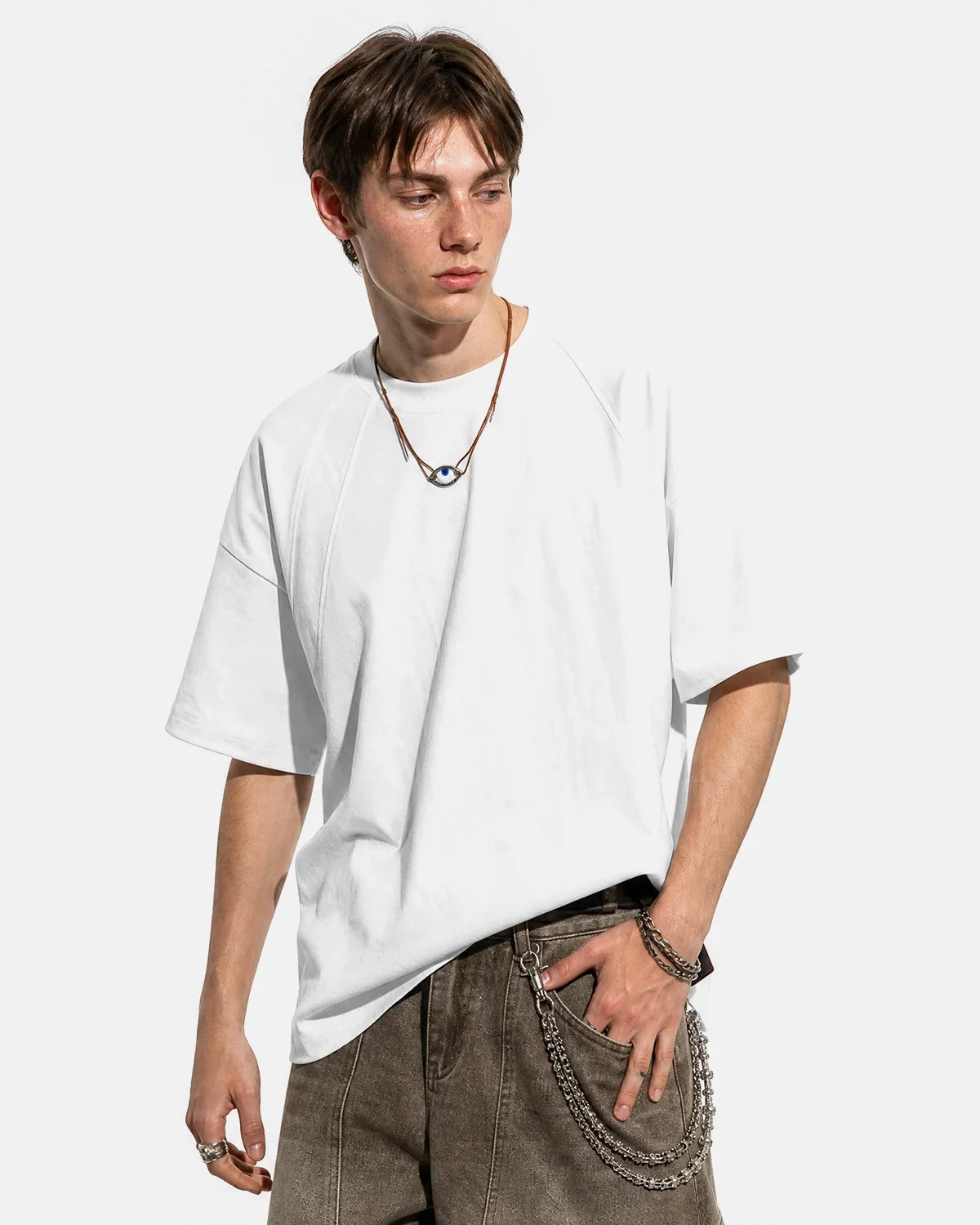 Boxy deconstructed T-shirt by INFLATION Streetwear featuring a relaxed fit and modern design, shown in a casual front view.