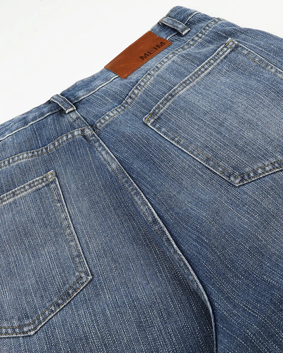 Inflation Streetwear studded bamboo weave jorts, casual pants with metal studs and woven bamboo design for a trendy street look.