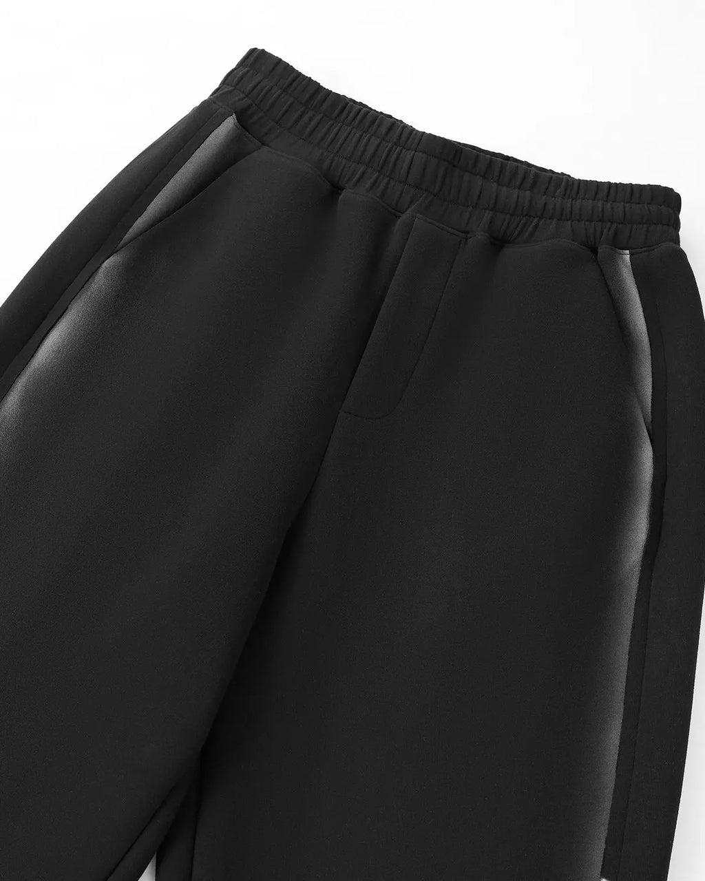 Inflation Streetwear stitching spray-painted graffiti sweatpants with bold colorful designs and relaxed fit.