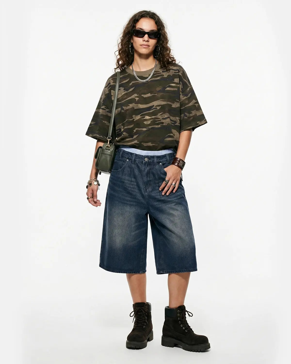 Boxy camo T-shirt by INFLATION featuring a relaxed fit and military-inspired camouflage pattern on soft fabric.
