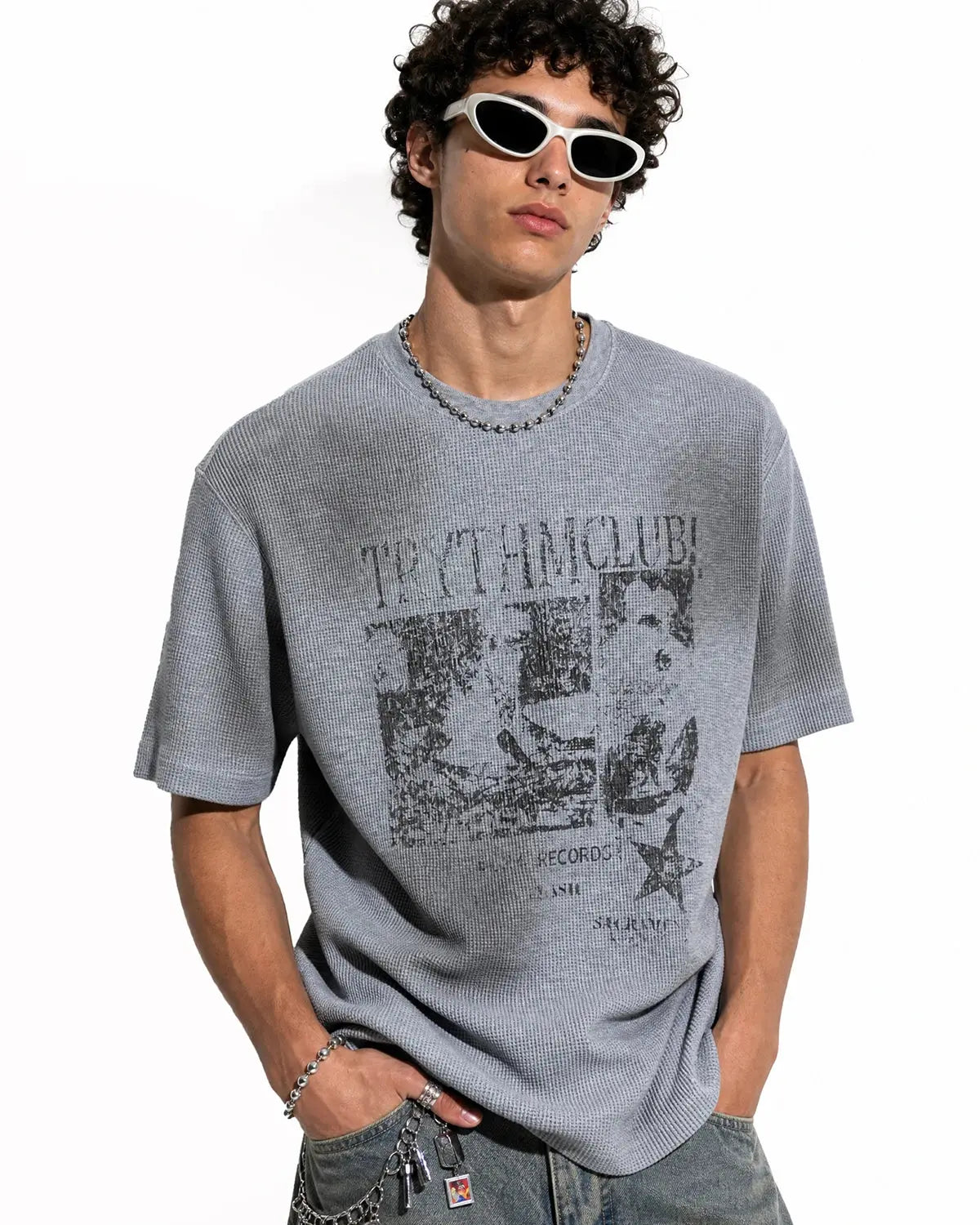 Inflation Streetwear distressed graphic waffle T-shirt featuring a faded design, casual fit, and soft fabric for streetwear style.