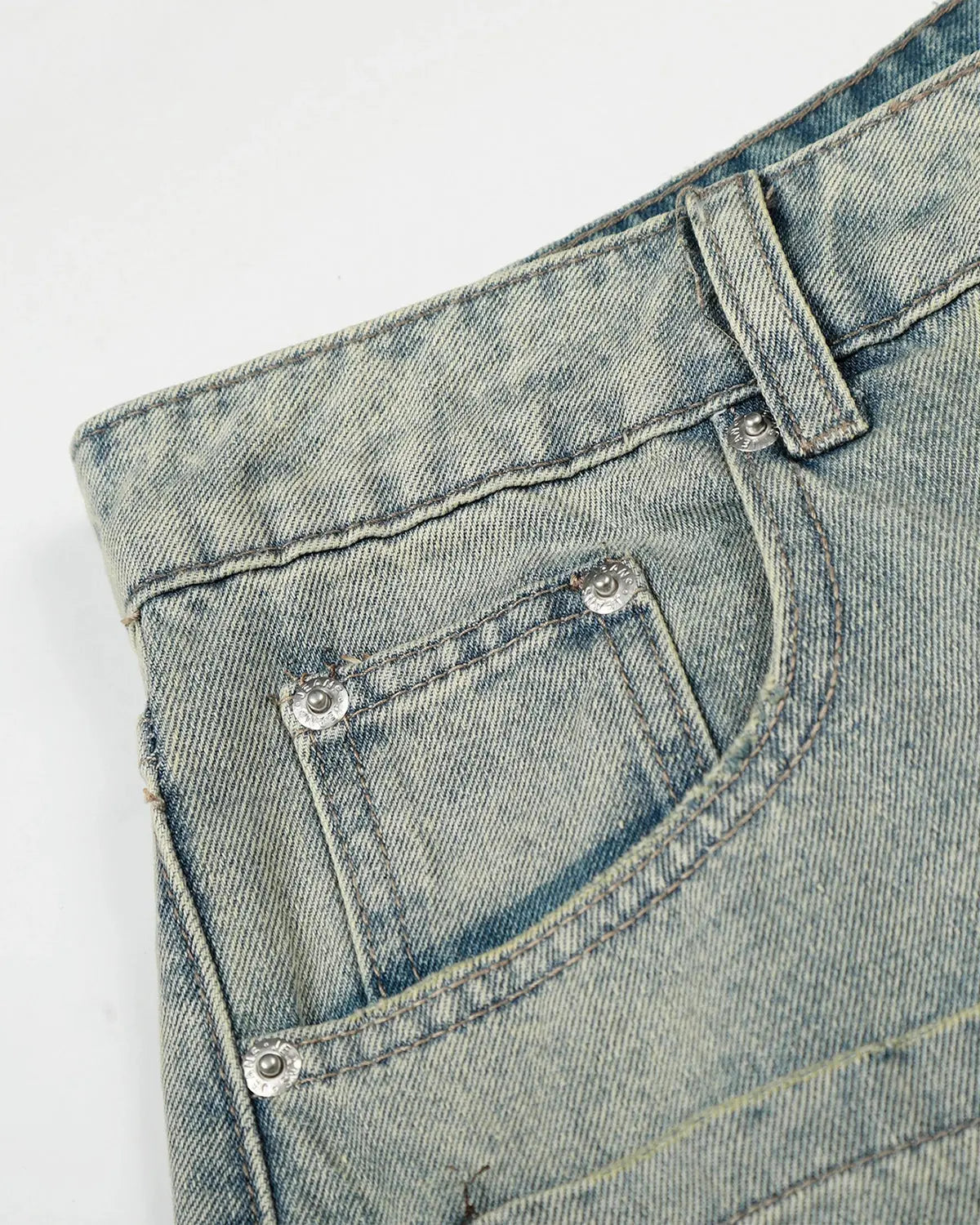 Acid wash rhinestone baggy jeans by INFLATION with distressed details and rhinestone embellishments, casual streetwear style.