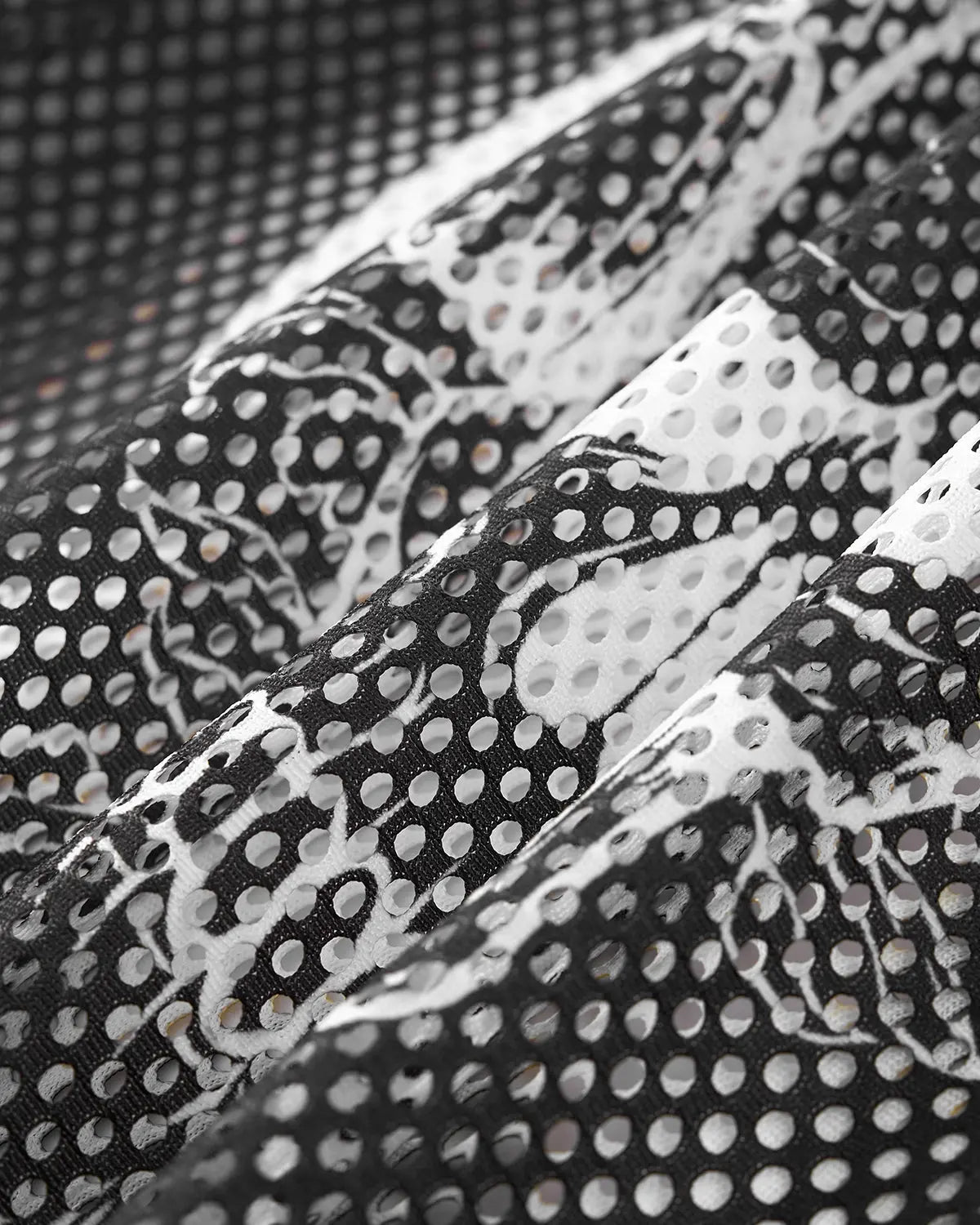Inflation Streetwear mesh skeleton print long sleeve tee featuring a black skeleton design on a sheer mesh fabric.