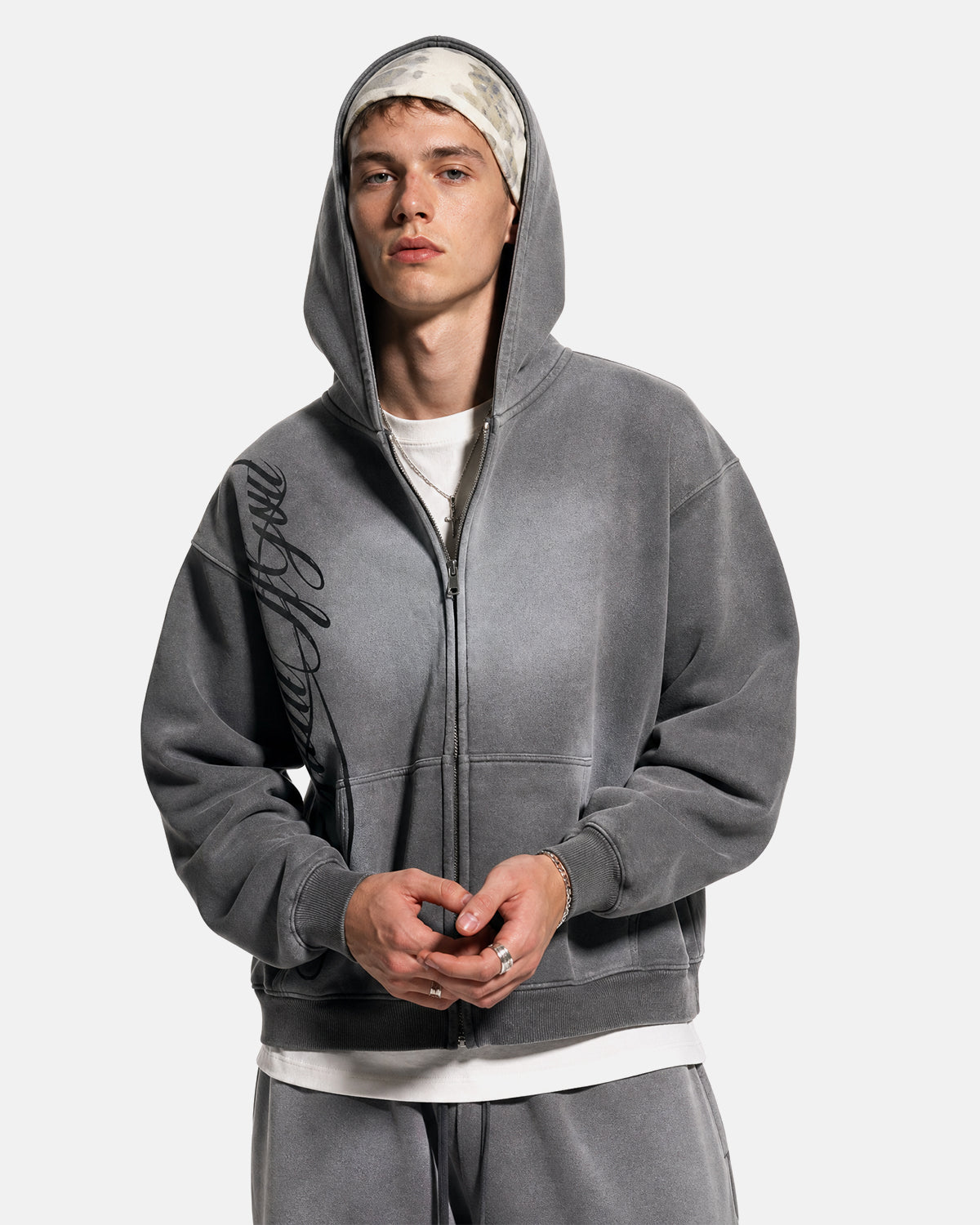 Inflation Acid Wash Zip Up Hoodie featuring a front zipper, hood, and casual streetwear style with a bold acid wash pattern.