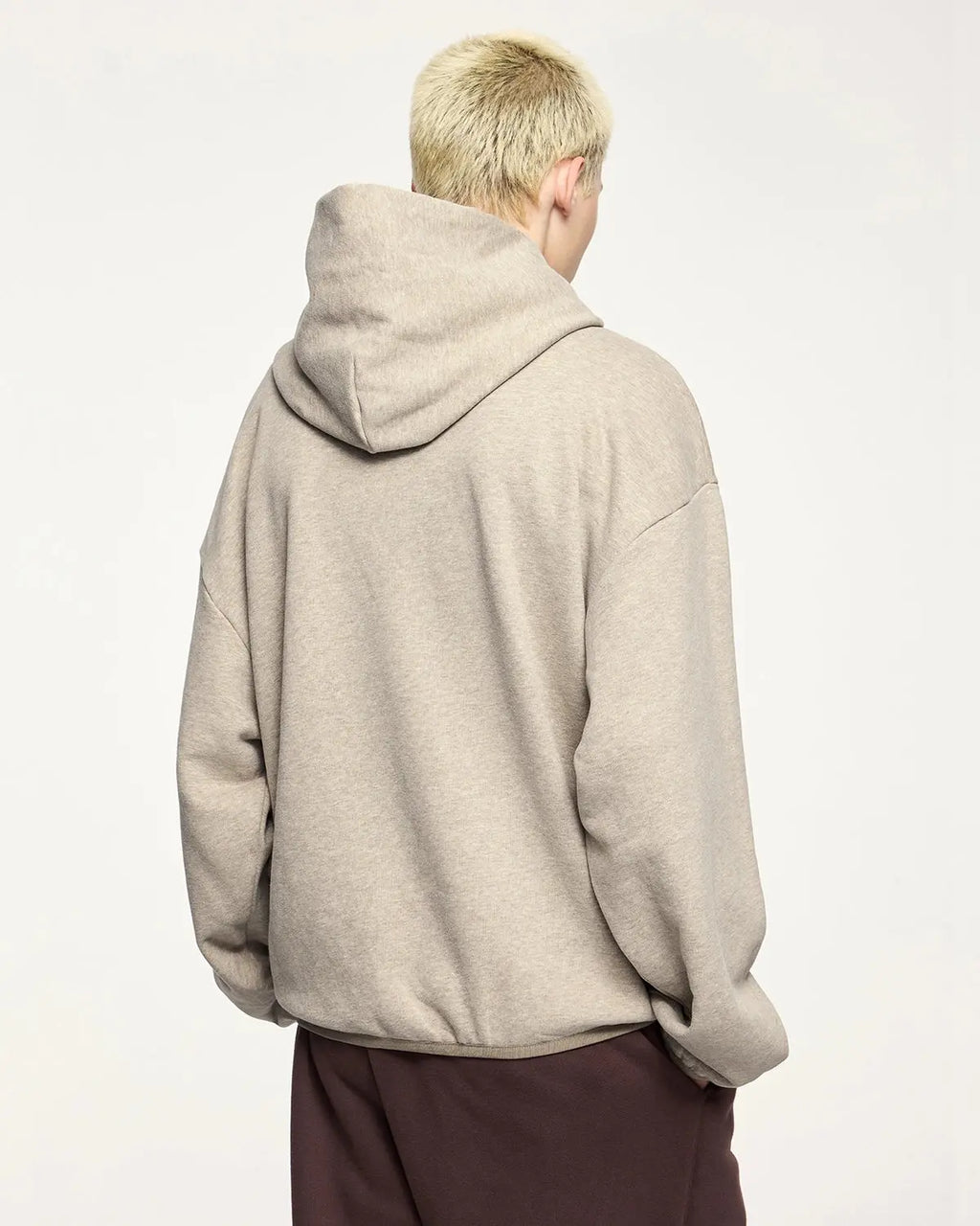 Black premium velvet hoodie from INFLATION's streetwear collection, featuring a soft, plush texture and relaxed fit.