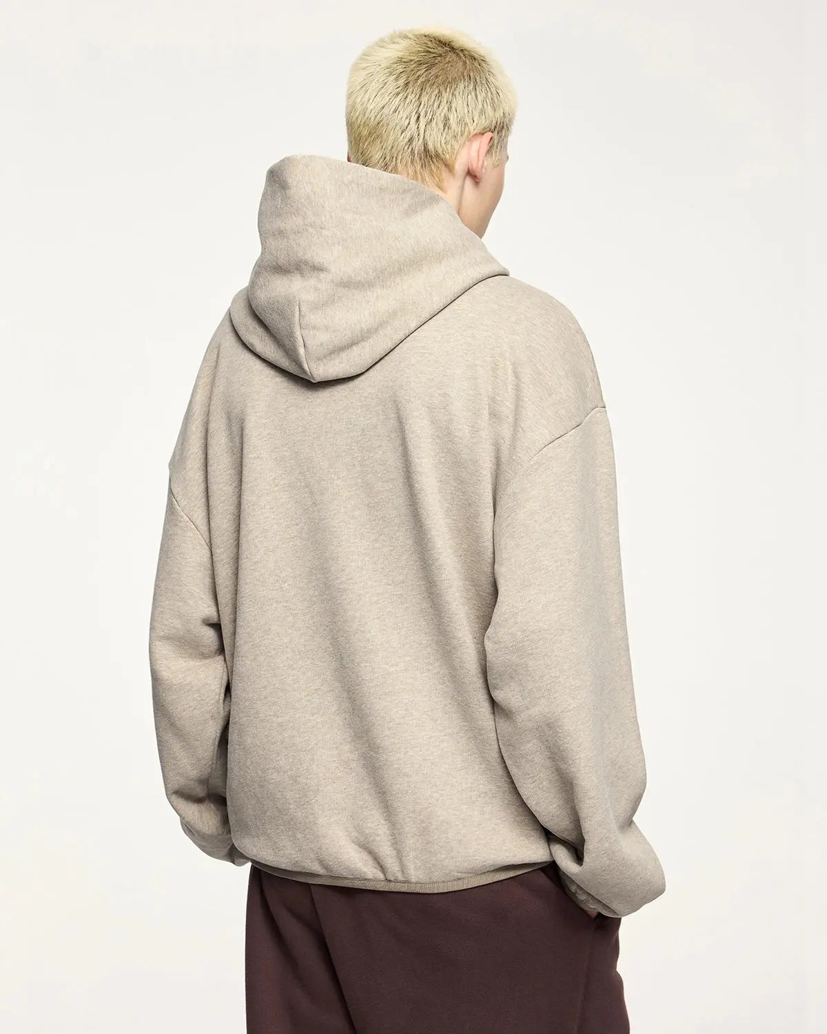 Black premium velvet hoodie from INFLATION's streetwear collection, featuring a soft, plush texture and relaxed fit.