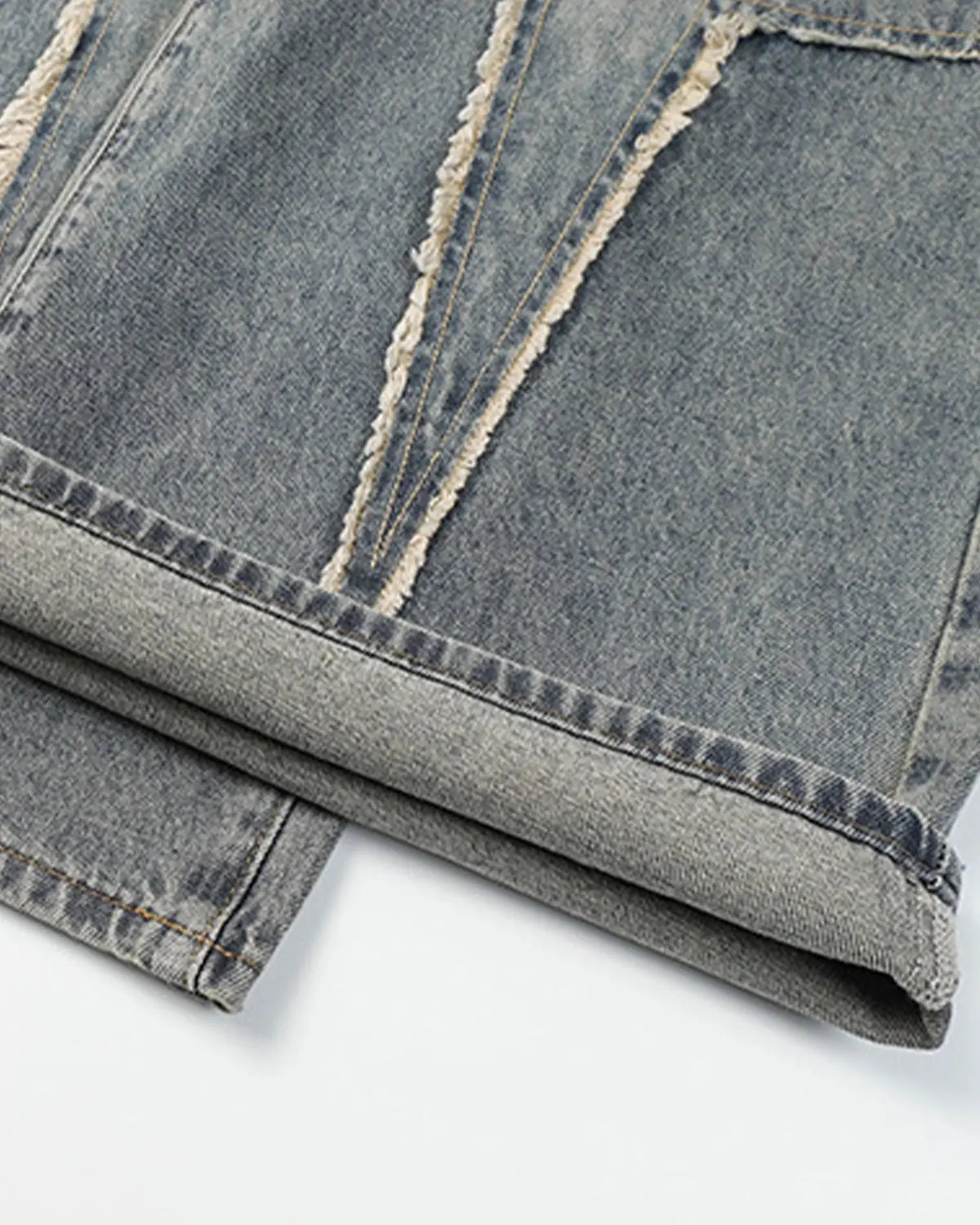 Star patched baggy jeans by INFLATION featuring distressed details and a relaxed fit, styled with a casual streetwear look.