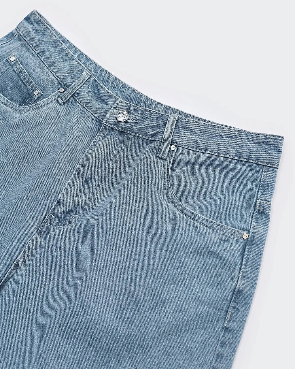 Vintage washed INFLATION straight jorts, denim pants with a relaxed fit and distressed detailing for a casual summer look.