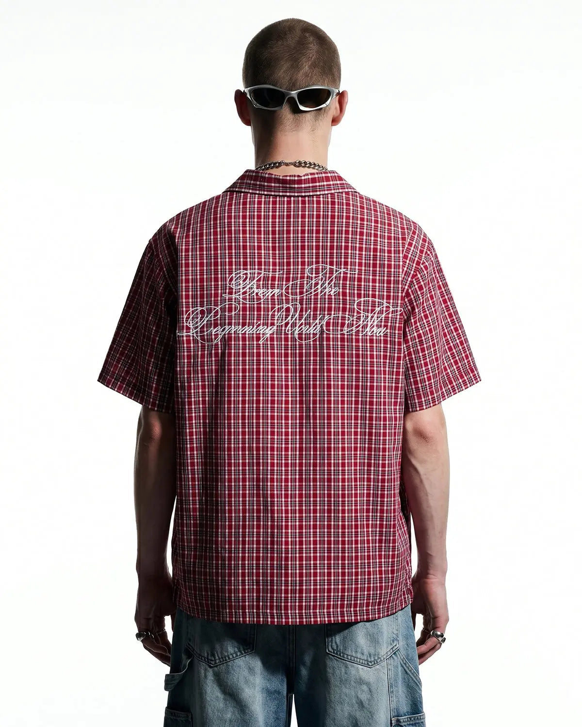 Inflation Streetwear plaid script embroidered short-sleeve shirt with colorful plaid pattern and embroidered logo on front.