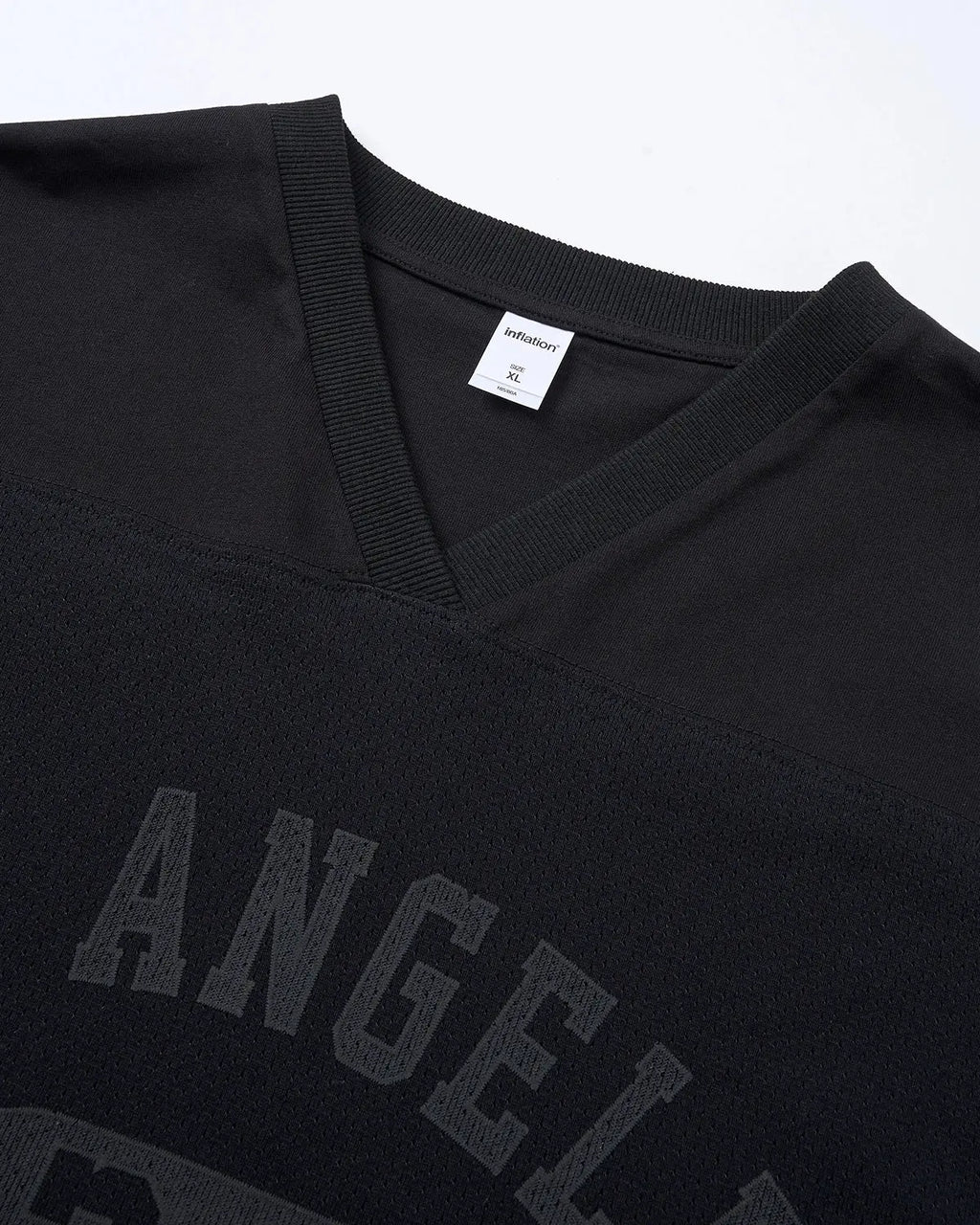 Inflation Streetwear 24 Graphic Mesh Basketball Jersey with bold printed design and breathable mesh fabric, black and white color scheme.