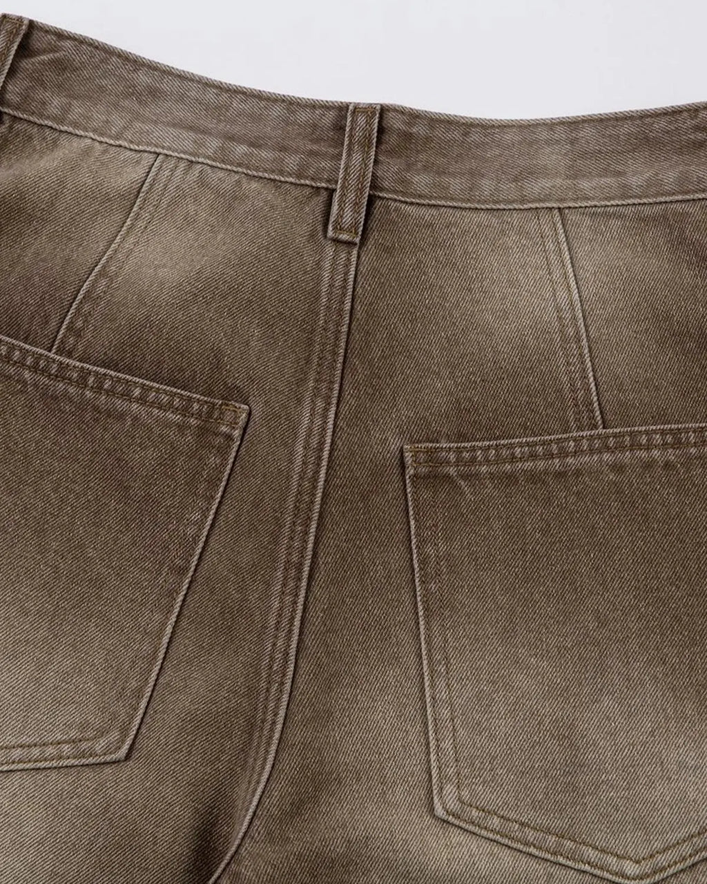 Brown acid wash barrel jeans by INFLATION Streetwear featuring relaxed fit and vintage-inspired style.