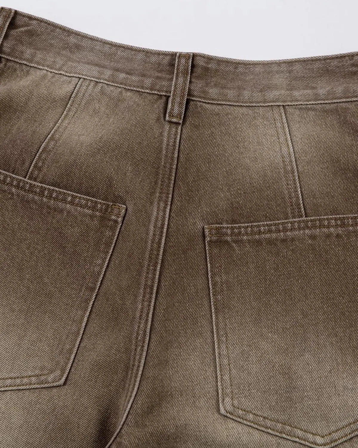 Brown acid wash barrel jeans by INFLATION Streetwear featuring relaxed fit and vintage-inspired style.