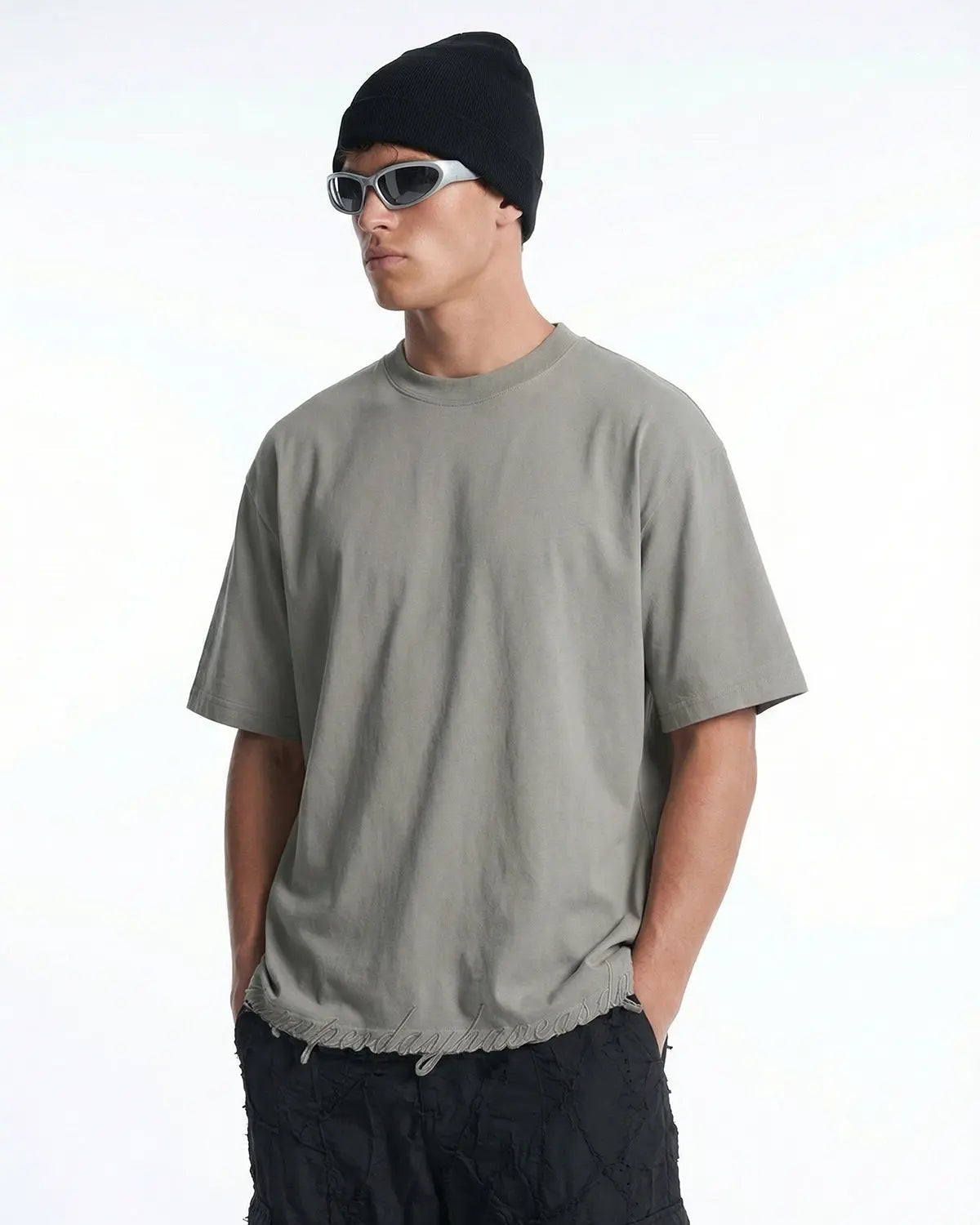 Inflation Streetwear embroidered frayed hem oversized T-shirt in white with colorful stitched design, relaxed fit, casual style.