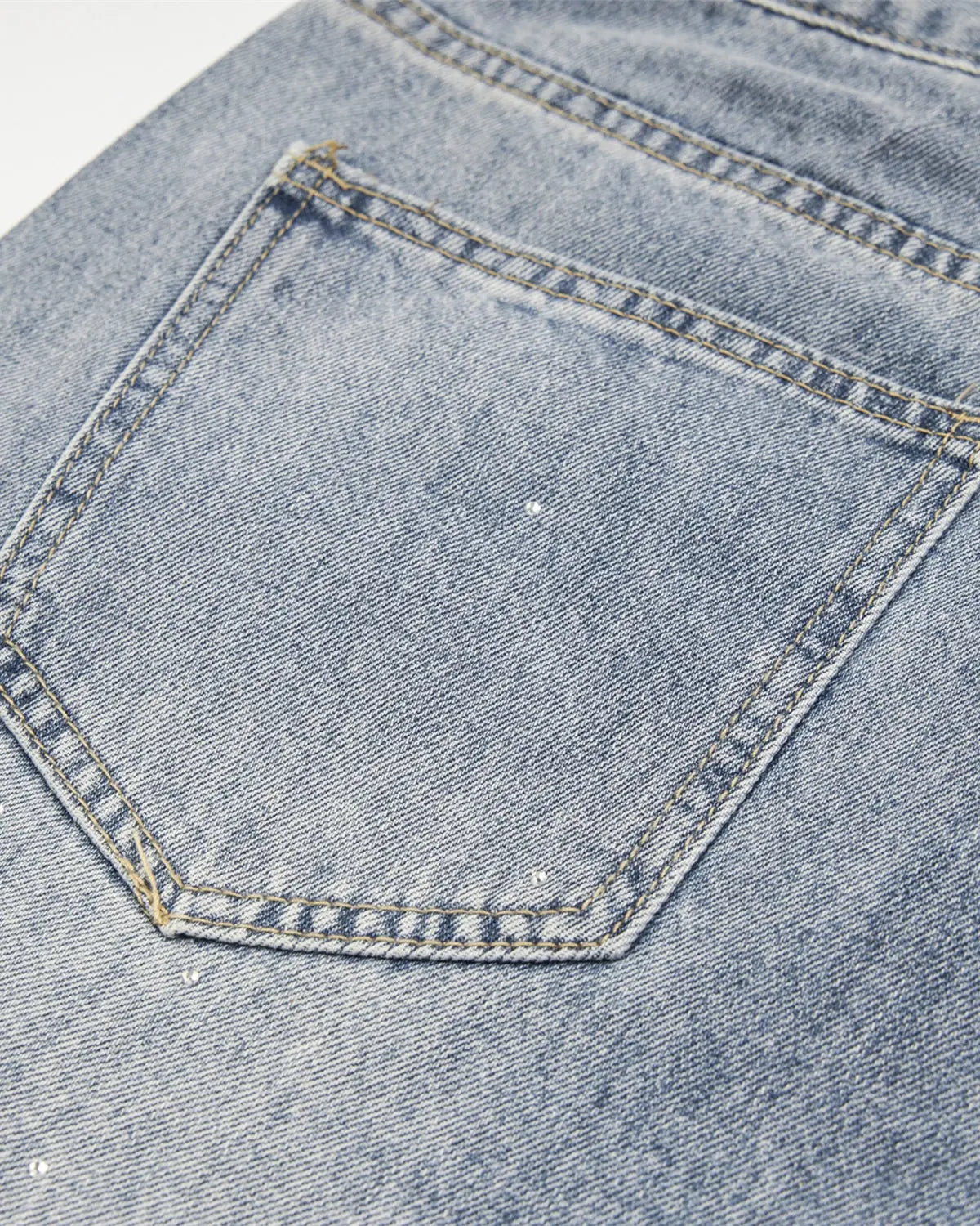 Inflation Streetwear studded rhinestone baggy jeans with embellishments, showcasing a relaxed fit and trendy street style.