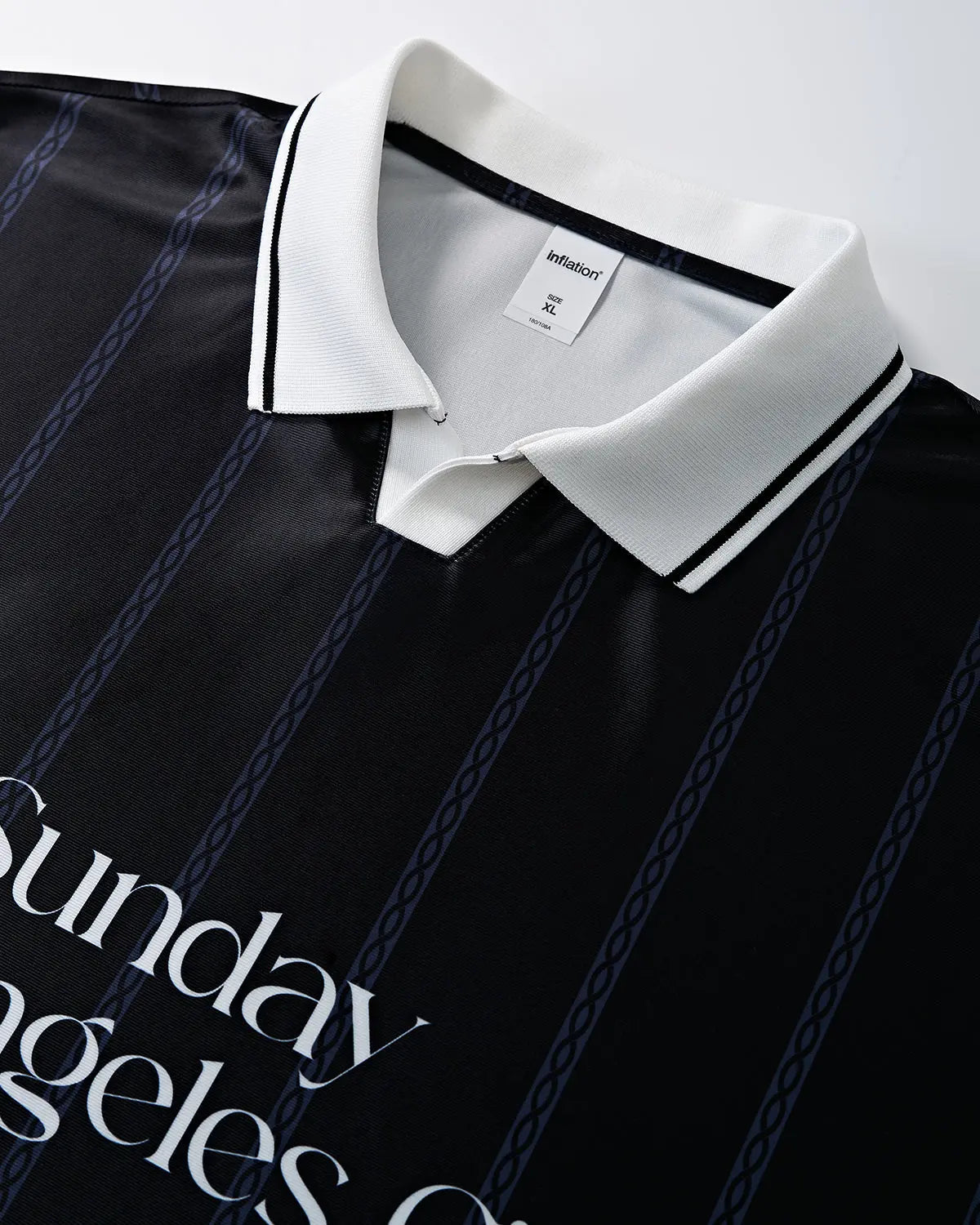 Vintage striped polo jersey by INFLATION featuring classic design and vibrant colors, styled for streetwear fashion.