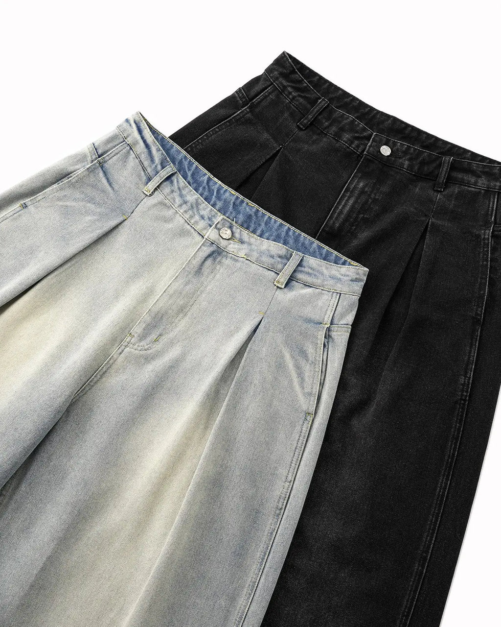 Acid washed super baggy jeans by INFLATION Streetwear, showing the relaxed fit and distressed denim style.