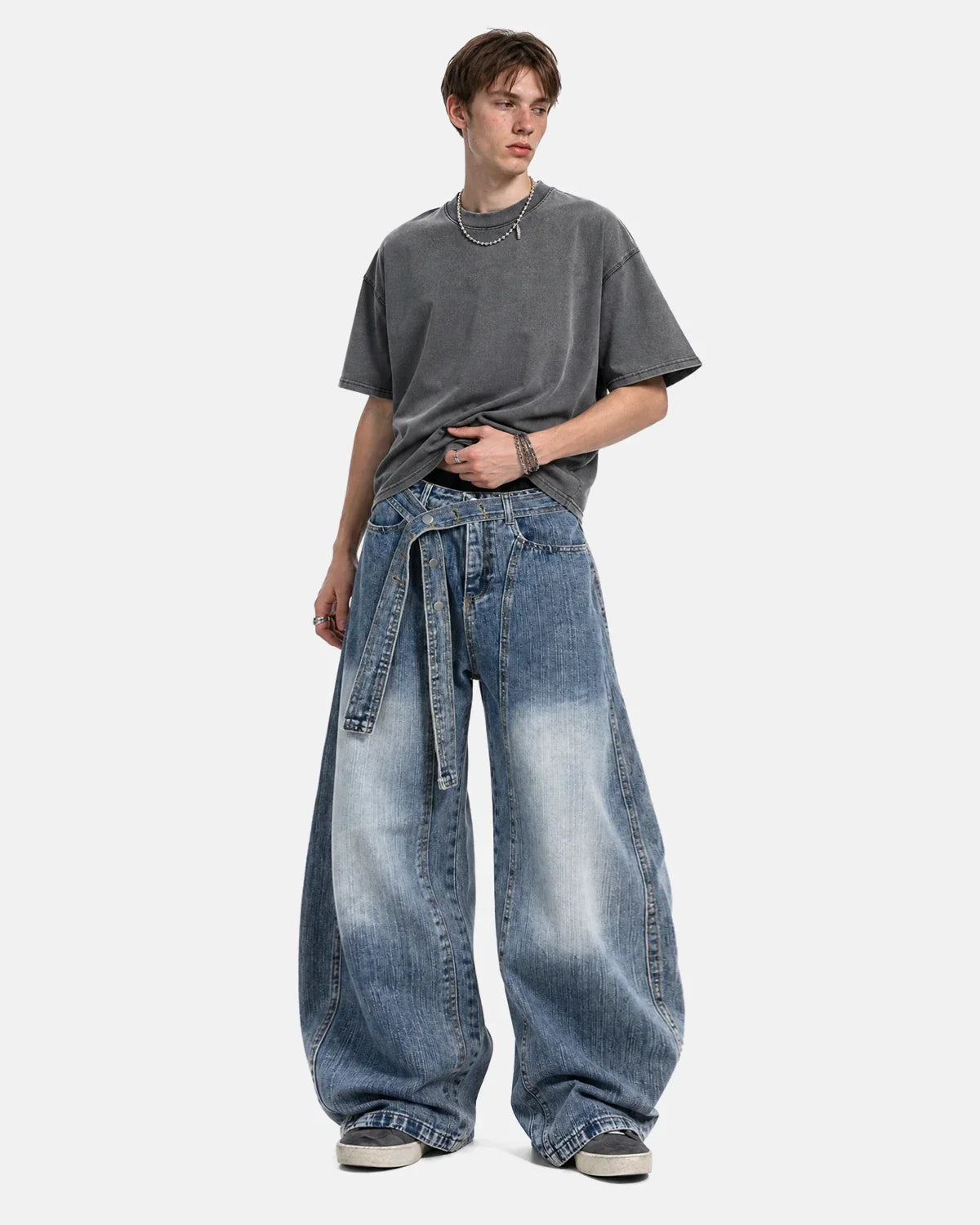 Inflation Streetwear belted bamboo weave barrel jeans displayed on a model, showcasing the relaxed fit and stylish design.