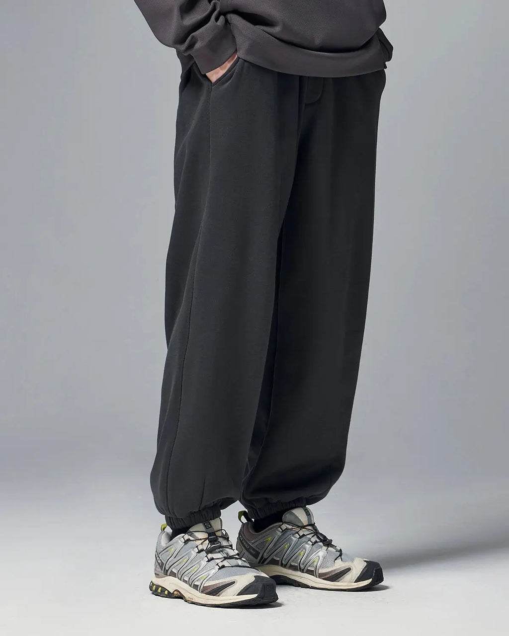 Relaxed fit cozy joggers by INFLATION Streetwear, soft fabric, elastic waistband, and tapered cuffs for comfortable casual wear.