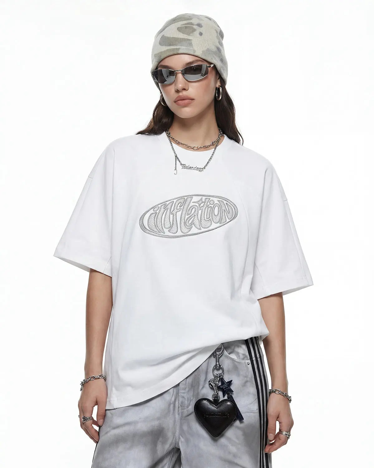 Hollow embroidered graphic T-shirt by INFLATION featuring bold embroidery and streetwear style on soft cotton fabric.
