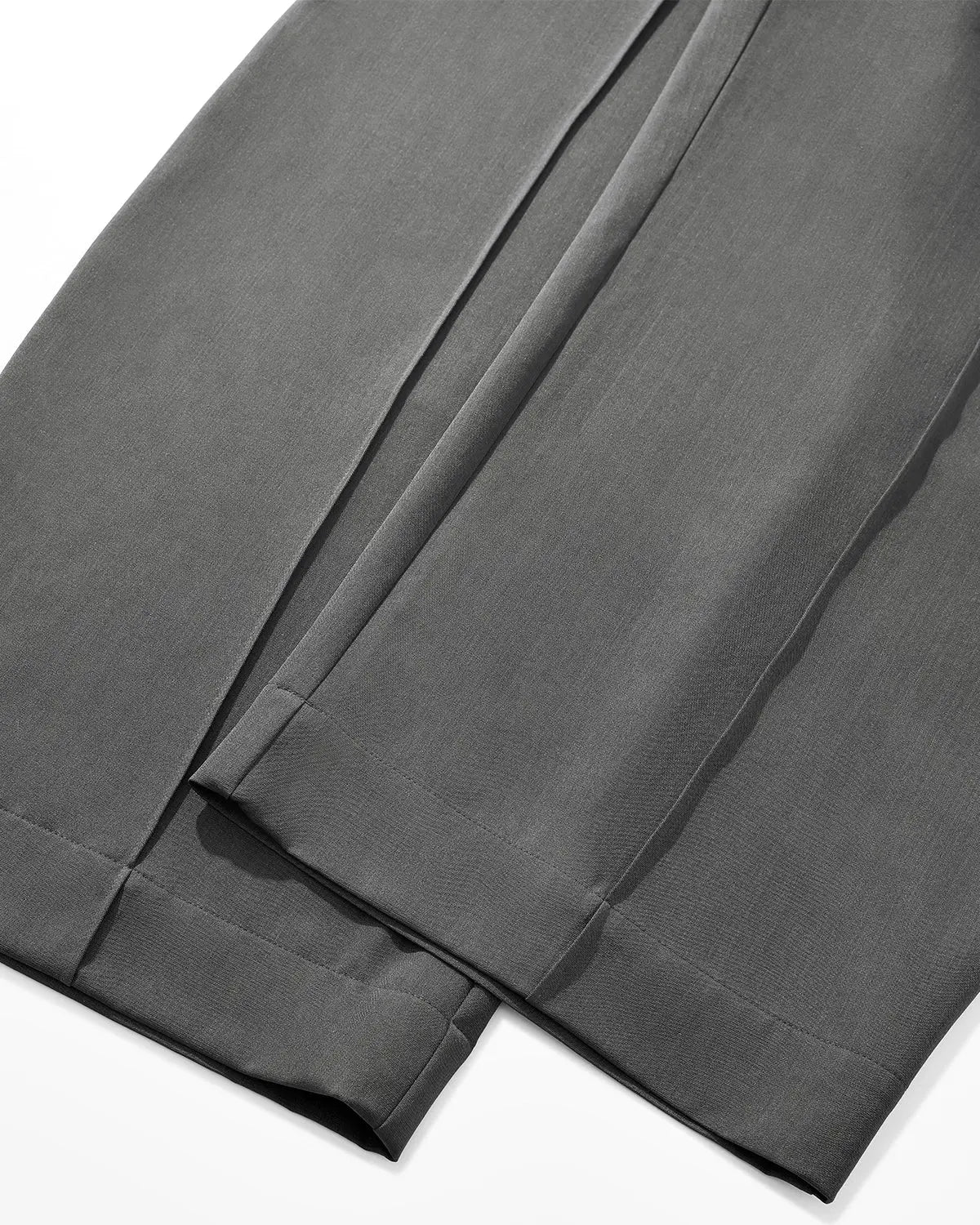 Inflation Cleanfit Baggy Suit Pants in black, loose fit streetwear style with elastic waistband and relaxed silhouette.