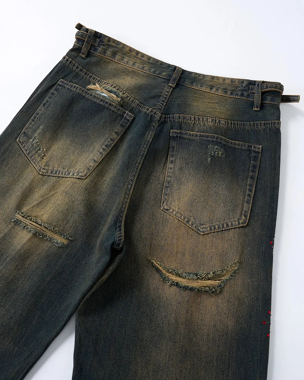 Inflation Dirty Wash Rhinestone Baggy Jeans featuring distressed denim and rhinestone embellishments on a streetwear style pair.