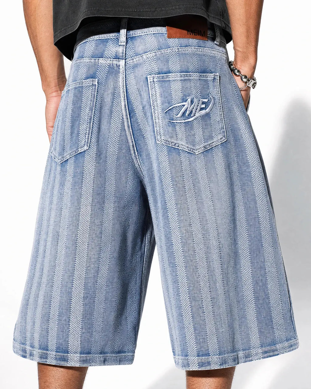 Woven texture baggy jorts by INFLATION, streetwear denim shorts with a relaxed fit and casual woven fabric appearance.