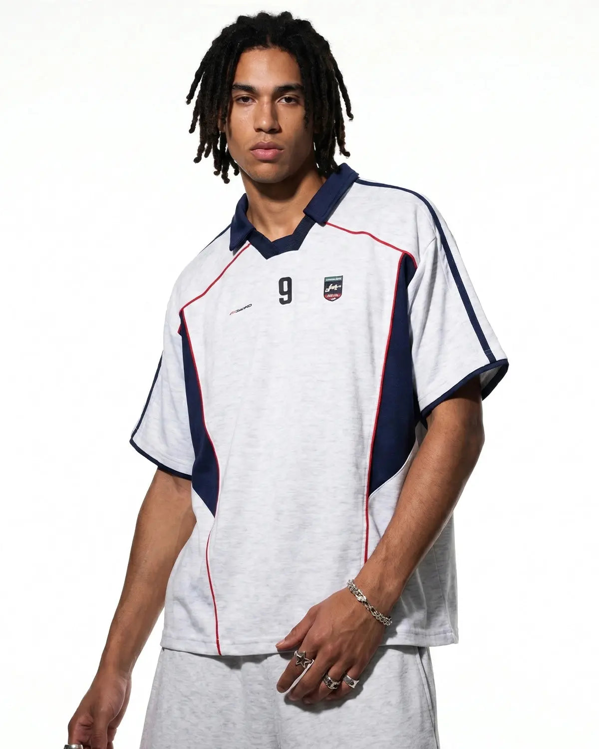 Color Block Graphic Jersey Tee by INFLATION featuring bold color blocks and streetwear-inspired design