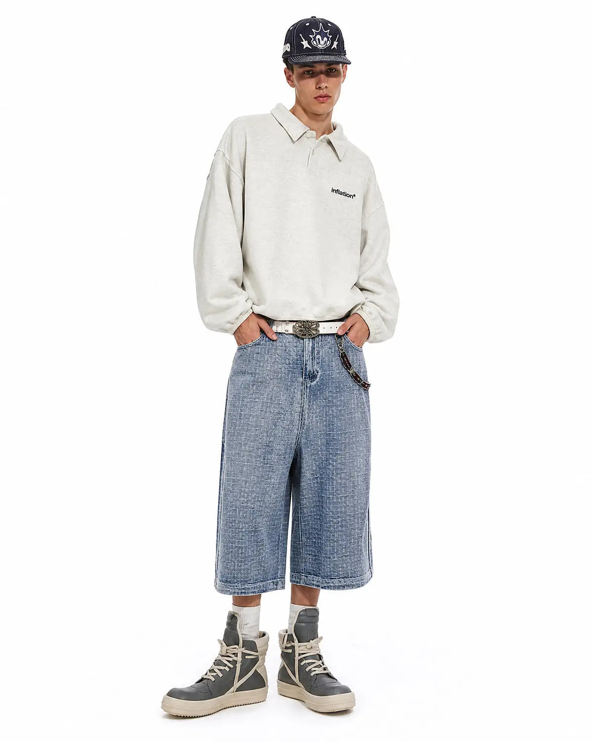 Baggy jorts with grid texture from Inflation Streetwear, showing the relaxed fit and stylish distressed denim design.