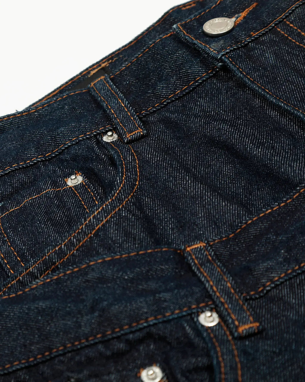 Inflation brand double waist raw baggy jeans with a relaxed fit, featuring distressed details and a streetwear style.