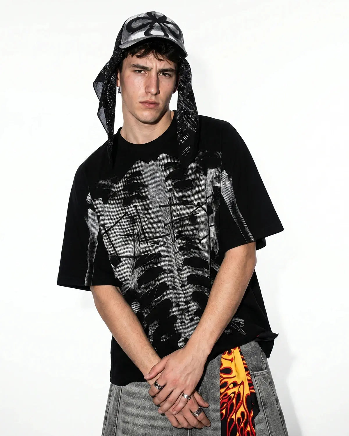Pink X-ray skeleton boxy T-shirt by INFLATION featuring a detailed skeleton design on the front.