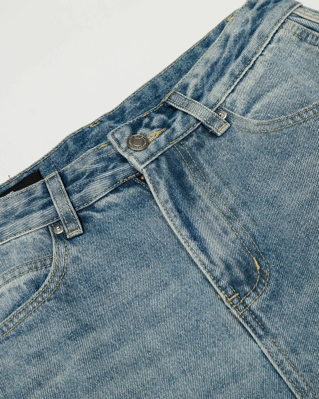 Acid wash striped side baggy jeans by INFLATION with relaxed fit and distressed details, displayed on a neutral background.