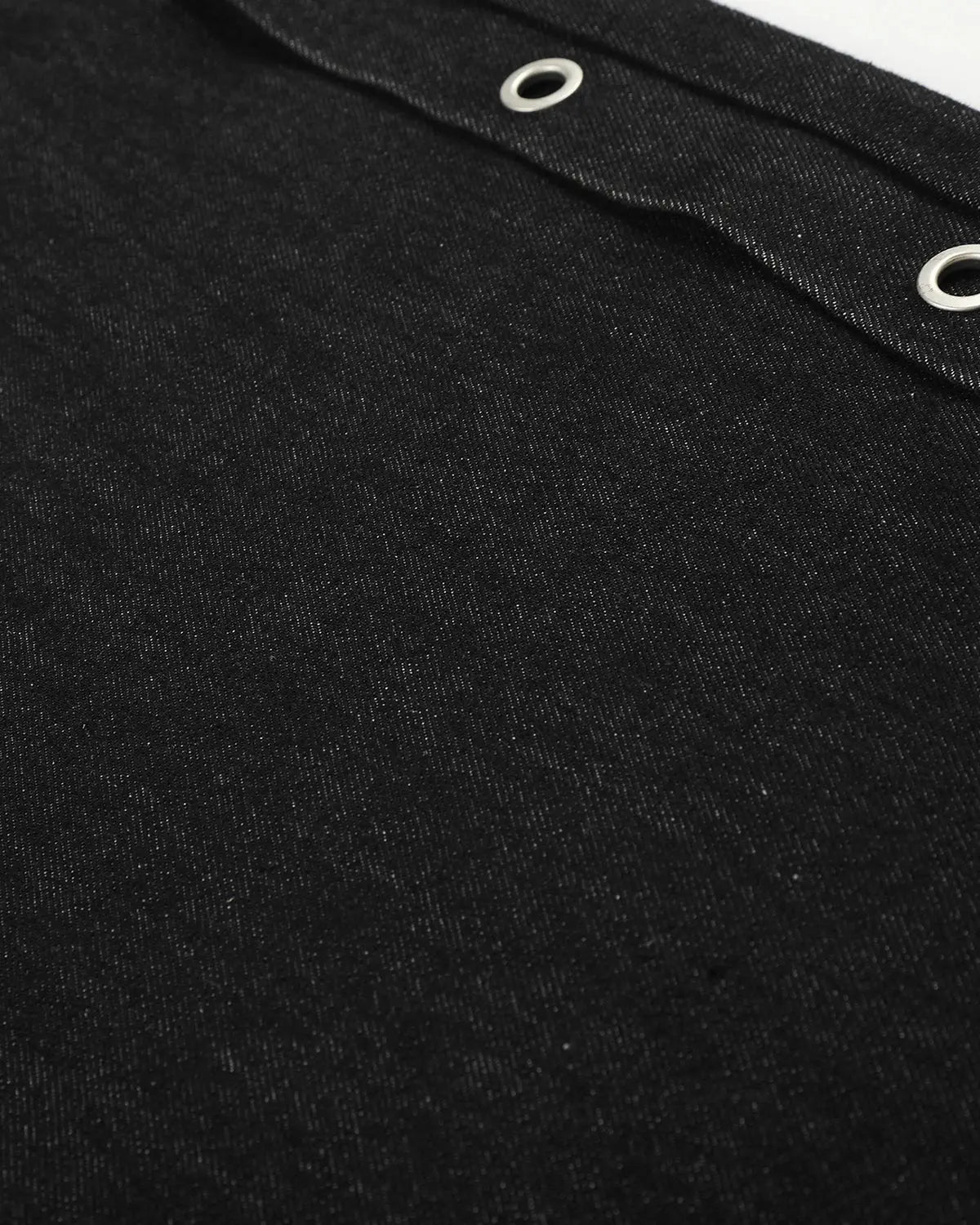 Inflation Streetwear barrel jeans with side eyelet buttons, showcasing a stylish denim design and unique button details.