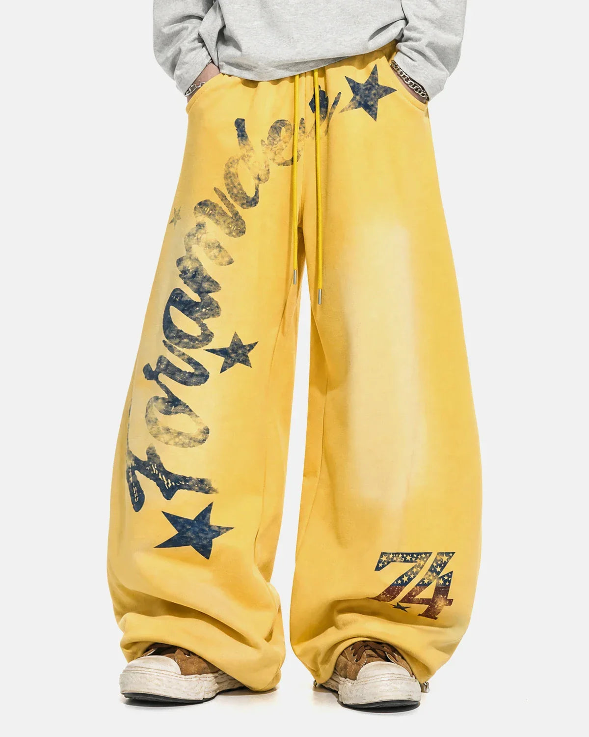 Inflation Streetwear star graphic barrel sweatpants with bold star print and relaxed fit, made from comfortable fabric.