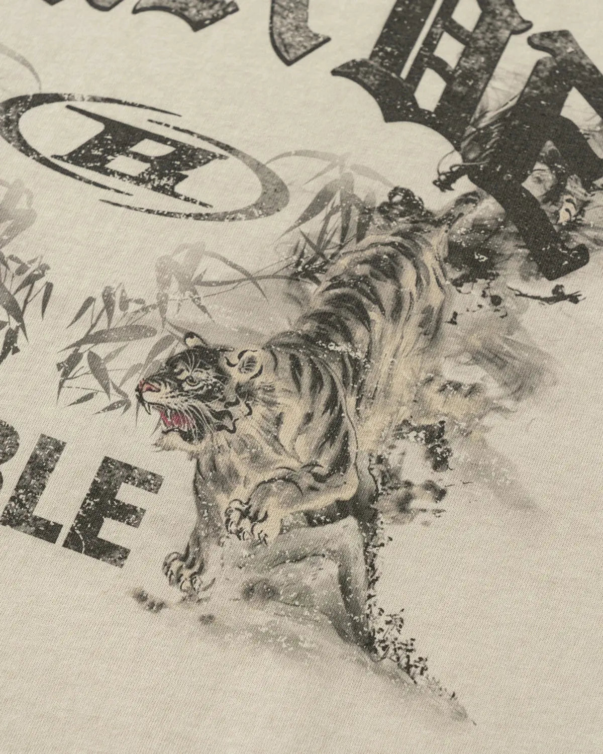 Graphic washed vintage oversized T-shirt by INFLATION featuring distressed print, relaxed fit, and streetwear style.