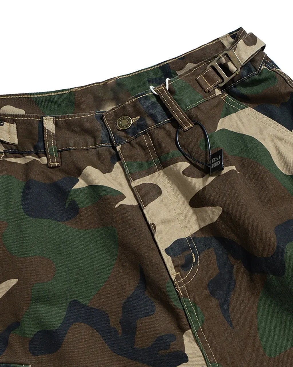 Camo layered longline jorts by INFLATION Streetwear featuring distressed denim and a relaxed, layered style.