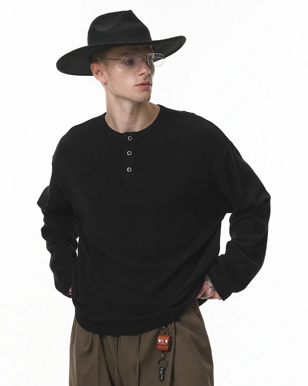 Inflation Streetwear Henley collar long sleeve T-shirt in black with buttoned placket and fitted style.