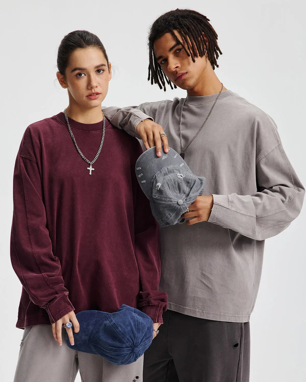 Inflation brand distressed acid wash oversized long sleeve T-shirt with a relaxed fit and faded, worn-in look.