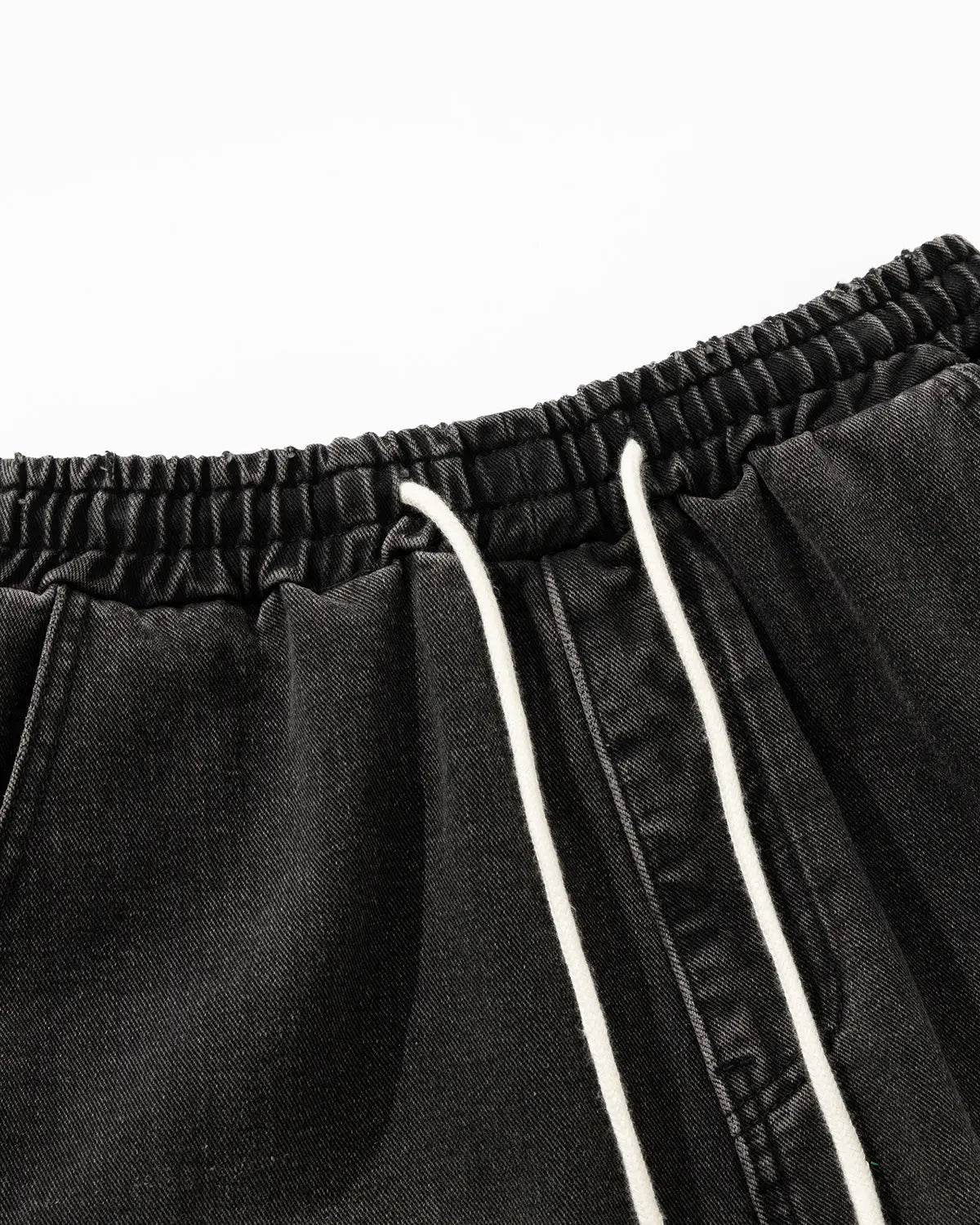 Inflation brand washed denim cargo shorts with drawstring, casual streetwear pants featuring multiple pockets and a relaxed fit.