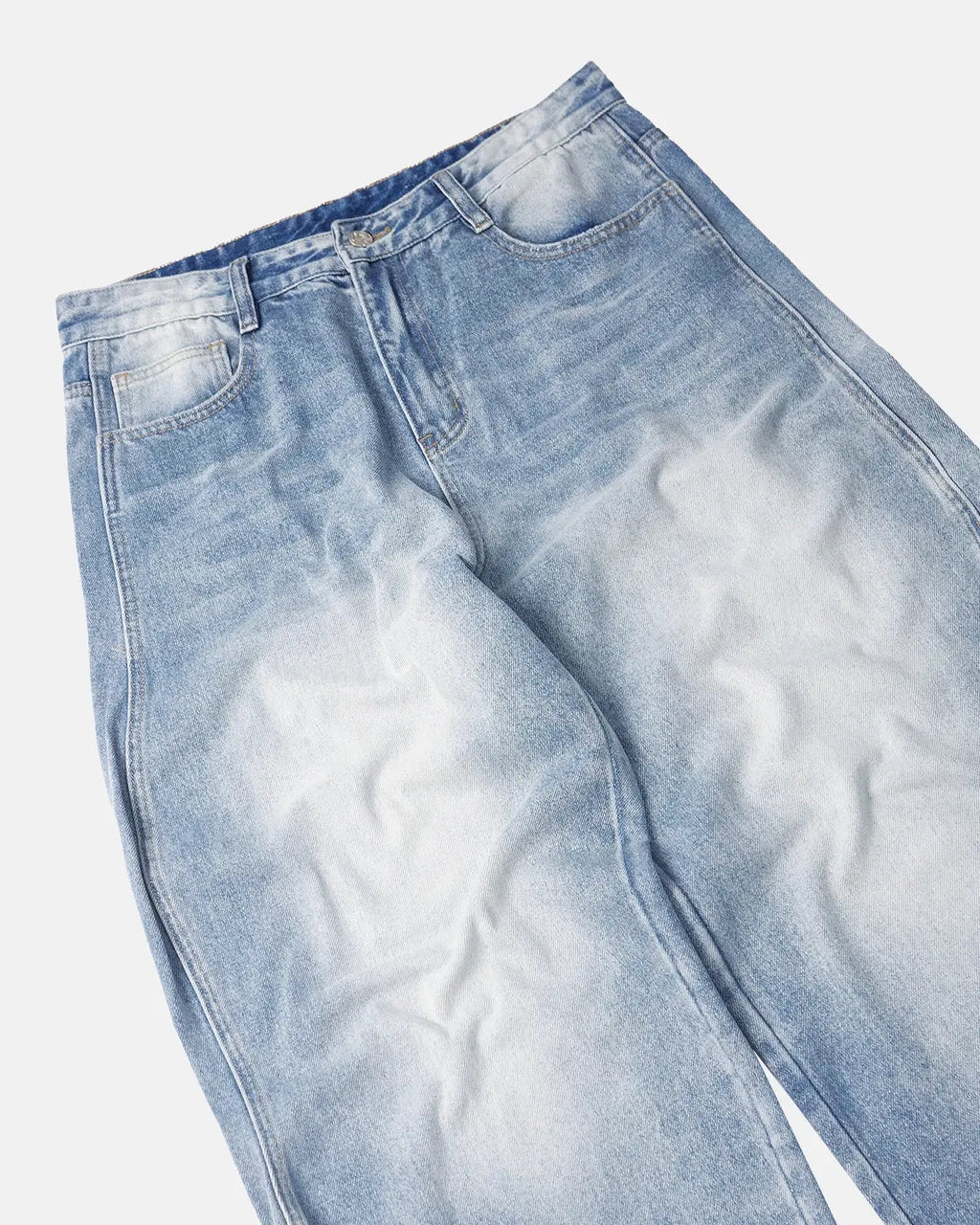 INFLATION washed baggy denim pants with relaxed fit, featuring faded wash and casual style on a model.