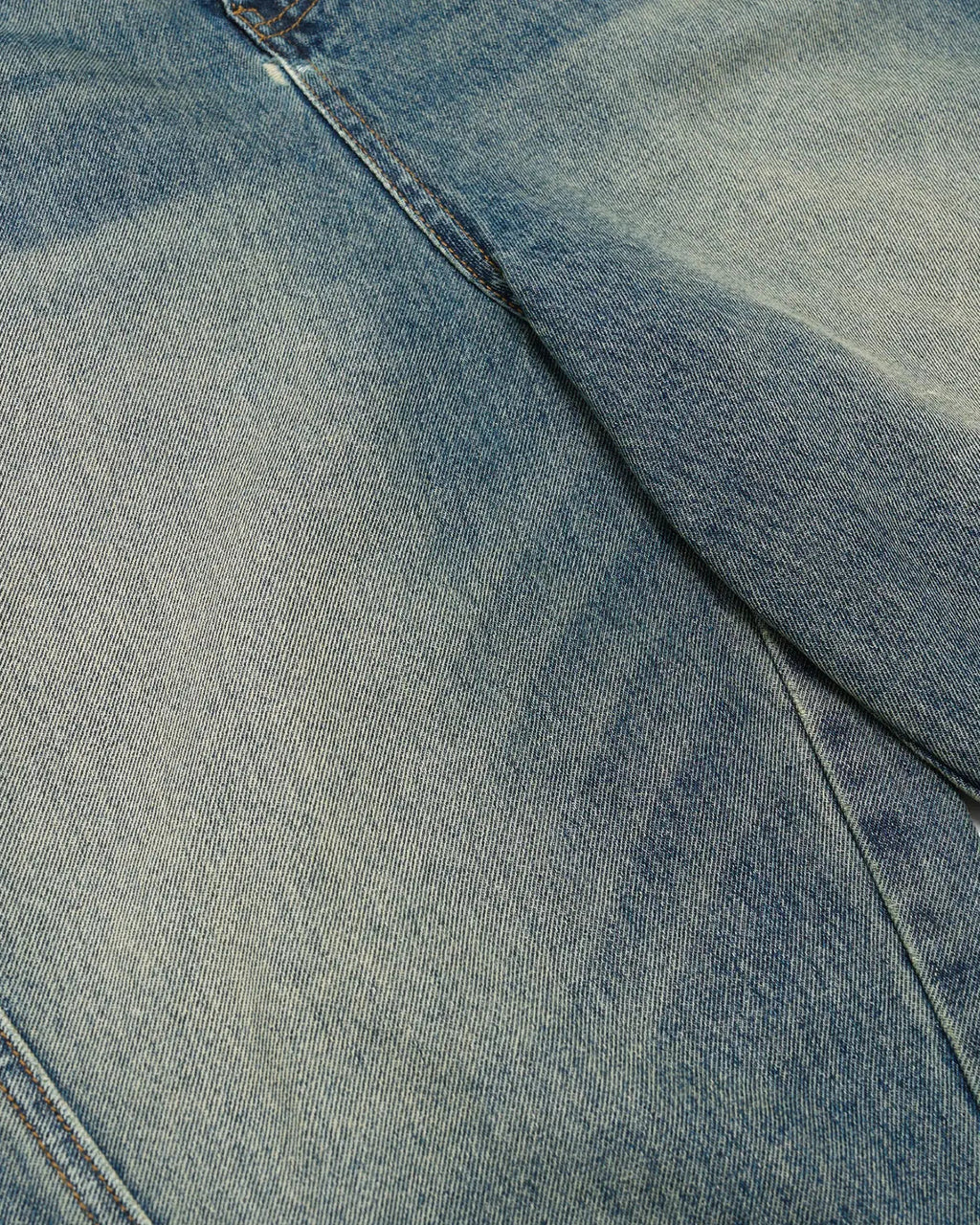 Inflation Streetwear Scimitar Denim Baggy Jorts, loose-fitting denim pants with distressed details and a relaxed fit.