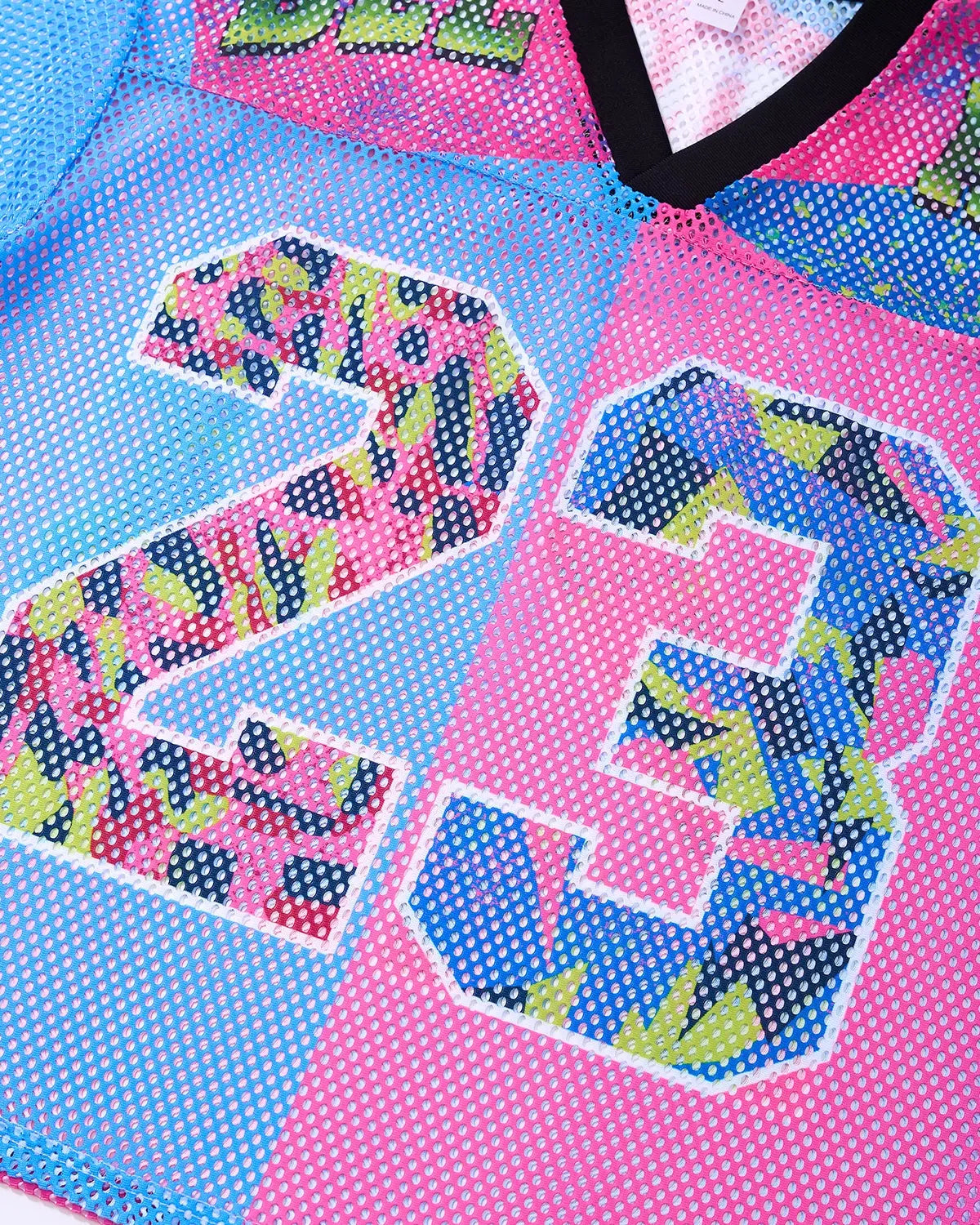 Inflation Camo Graphic Mesh Jersey Tee featuring camouflage print and breathable mesh fabric for streetwear style.