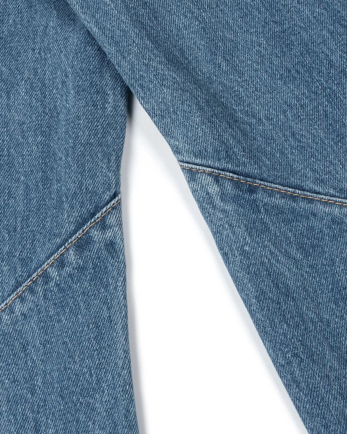 Distressed ripped baggy jeans from Inflation Streetwear with a relaxed fit, featuring frayed holes and a casual streetwear style.