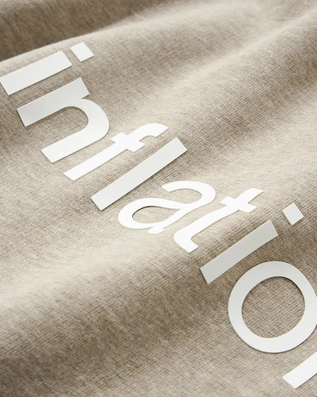 Inflation Streetwear quarter polo sweatshirt in black with ribbed collar and cuffs, casual streetwear style.
