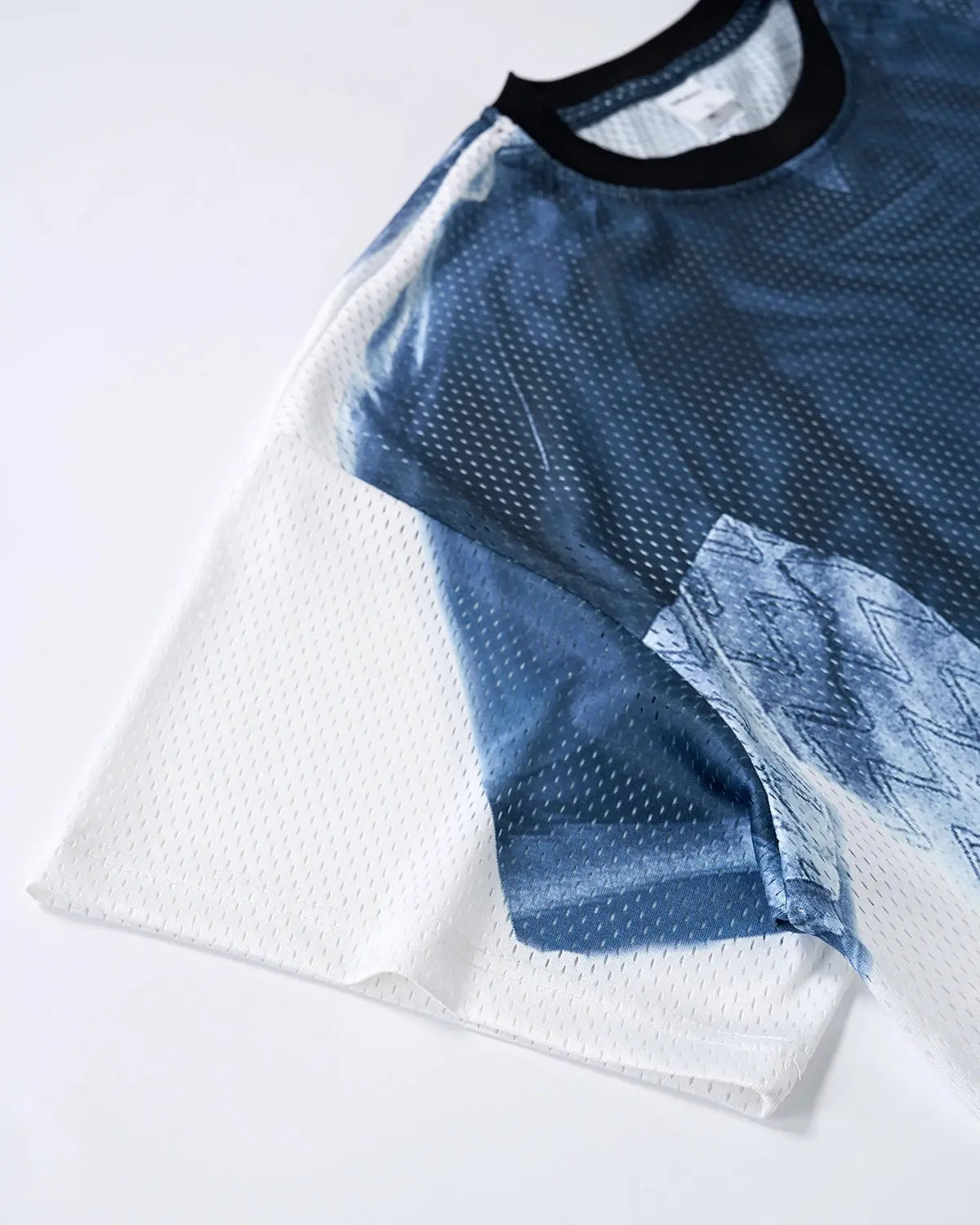 Digital printing mesh jersey T-shirt by INFLATION, featuring a lightweight, breathable fabric with vibrant graphic design.